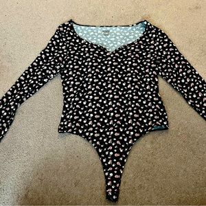 Long sleeve bodysuit from Pink. Size: X Large. Never been worn before.